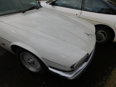 A 1993 Jaguar XJ-S Sports Coupe, registration K777 MEG, currently on SORN, last MOT expired 3rd July 2019, unlocked without keys, known mileage 125,803, no V5. To be sold upon instructions from the Executors of Susan Gaisford (Dec'd). - 16