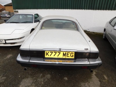 A 1993 Jaguar XJ-S Sports Coupe, registration K777 MEG, currently on SORN, last MOT expired 3rd July 2019, unlocked without keys, known mileage 125,803, no V5. To be sold upon instructions from the Executors of Susan Gaisford (Dec'd). - 17