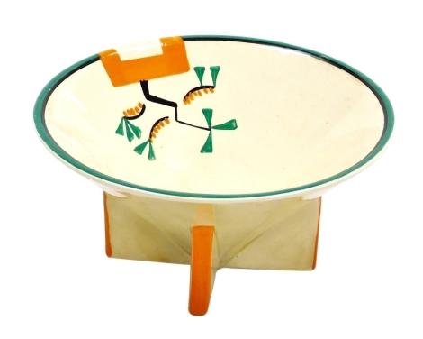 A Clarice Cliff Bizarre Ravel pattern conical bowl, hand painted with an abstract design in green, orange and black against a pale yellow ground, printed marks, 7.5cm high, 15.3cm diameter