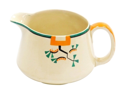 A Clarice Cliff Bizarre Ravel pattern jug, hand painted with an abstract design in green, orange and black against a pale yellow ground, printed marks, 11cm high.