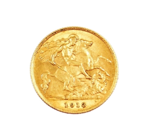 A George V gold half sovereign 1913, 4.0g.