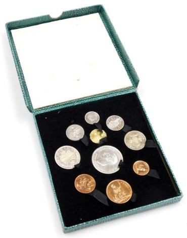 A Festival of Britain 1951 coin set, ten coins, crown to half penny, in a gilt tooled green faux shagreen case.