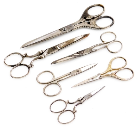 Six pairs of antique and vintage haberdashery and sewing scissors.