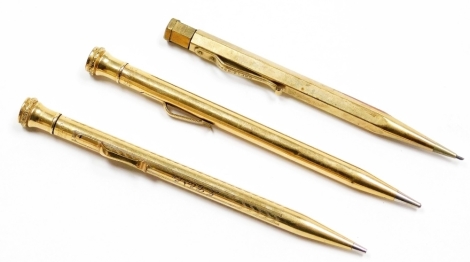 A Yard-O-Lead rolled gold propelling pencil, together with two Wahl Eversharp gold plated propelling pencils, one of plain form, the other with herringbone engraving, reserve named for J Clarke. (3)