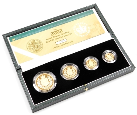 An Elizabeth II 2002 gold proof four coin sovereign collection, number 185, comprising five pound coin, two pound coin, sovereign and half sovereign, in fitted box, with certificate.