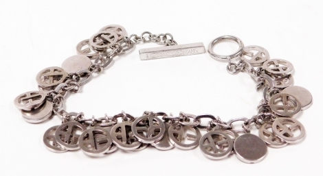 An Emporio Armani bracelet, with various circular links, and a T bar clasp, 19cm long, white metal stamped 925, 28.7g all in.