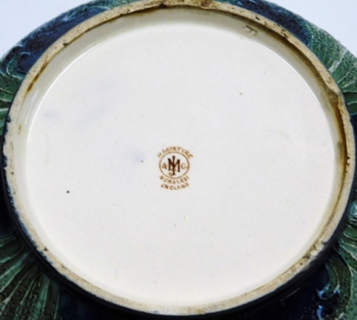 A Moorcroft Macintyre and Co Florian ware pottery tobacco jar, decorated with flowers against a textured green ground, lacking lid, 13cm diameter. - 3