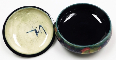 A Moorcroft pottery Leaf and Berry pattern powder bowl and cover, of circular form, impressed marks, 20cm diameter, (AF). - 2