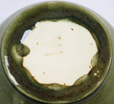 A Moorcroft pottery bowl, in a pale green glaze decorated with a raised band of vertical markings, impressed marks, 11cm high, 18.5cm diameter. - 3