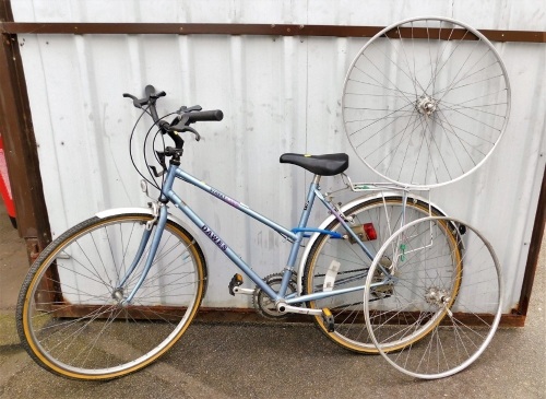 A Dawes Street Life bicycle, and two wheel rims.