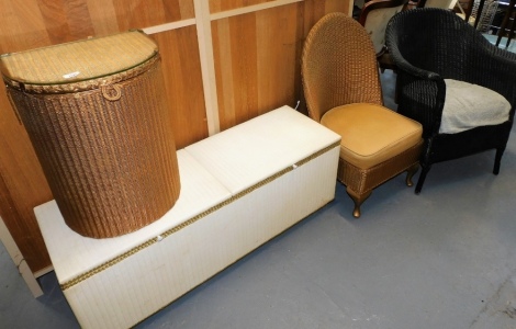 A quantity of Lloyd Loom style furniture, to include a lidded laundry box, chair, tub chair, etc. (a quantity) Lots 1501 to 1557 are available to view and collect at our additional premises SALEROOM NINE, Unit 9 Chandlers Yard, Grantham, NG31 6PG. For mo