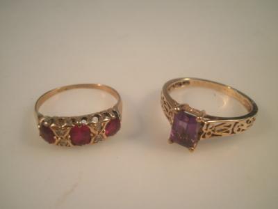 An 18ct gold ruby and tiny diamond set dress ring together with a 9ct gold