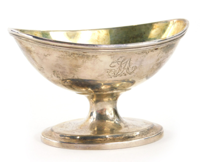 A George III silver salt by Christian ker Reid I, the oval part silver gilt bowl on an inverted stem and oval foot, Newcastle, c.1806, date mark rubbed, 7cm high, 3oz.