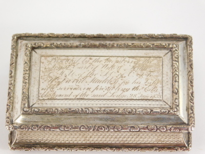 A William IV silver snuff box by John Tongue, the rectangular lid with a scroll outline with later engraving: Presented By The Members Of The Loyal Earl Of Wilton Lodge ... Dated 28th June 1838, with a plain silver gilt interior, 9cm wide, Birmingham, dat - 2