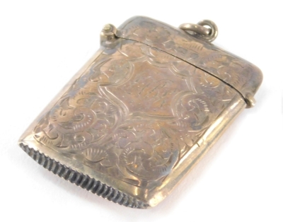 An Edward VII silver vesta case, of oblong form, with circular top, the body partially chased, with match strike end, Birmingham 1905, 5cm high.