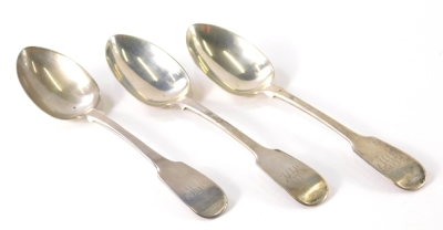 A set of three Victorian silver dessert spoons by Reid & Sons, fiddle pattern, initialled, Newcastle 1843, 17cm long, 4.3oz.