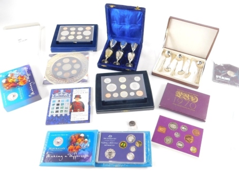 Various coin sets, to include 1884 United Kingdom uncirculated set, 2003 Australia Proof Set, Making a Difference, 2005 coin set, silver plated gold coloured spoons, various silver plated ware, goblets 7cm high, in fitted case, etc. (a quantity)