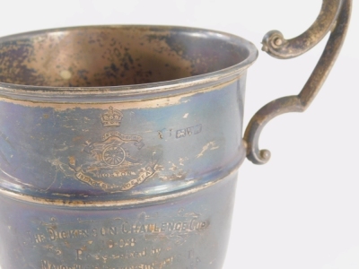 An Edwardian silver trophy, with flying scroll handles and bell shaped body on circular foot, partially engraved the Dickinson Challenge Cup, 1908, Lincolnshire, on ebonised stand, Chester 1908, 19cm high, 6½oz. - 2