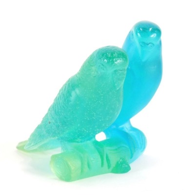 A opalescent blue and green glass figure group of two budgerigars, marked Daum France, 7cm high.