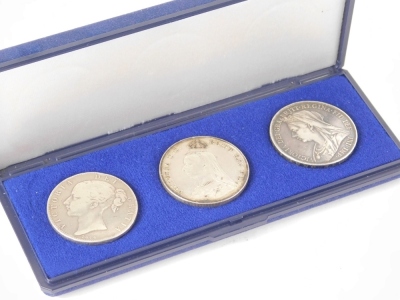 Coins, a Queen Victoria three crown set, young head, jubilee head and old head, in a fitted case.