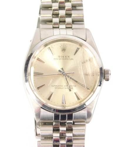 A gentleman's steel Rolex Oyster Perpetual Chronometer watch, with baton pointers and numerals, 3cm diameter dial, stainless steel bracelet, in fitted case with paperwork, Rolex card model no. 1002/0 Serial No. 839122, other paperwork showing when it was