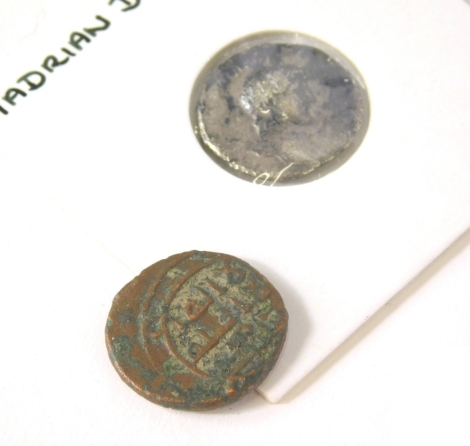 A Roman coin, Hadrian Denarius, 117-38 and a further Roman style coin. (2)