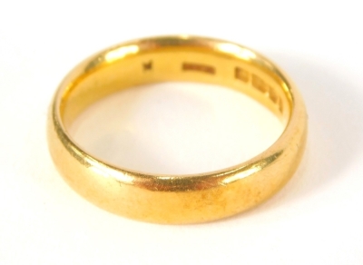 A 22ct gold wedding band, of plain form, size L, 6.5g.