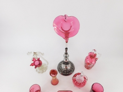 Various cranberry and other ruby flash glass, etc., a Mary Gregory style cup with plain handle, decorated with child, 11cm high, ewer basket with plain supports, open dish, an epergne with silver plated stand, etc. (a quantity) - 3