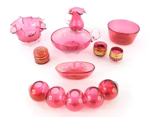 Various cranberry and other glassware, sugar bowl, 12cm diameter, flared basket, shaped circular vase, set with five sections, etc. (a quantity)