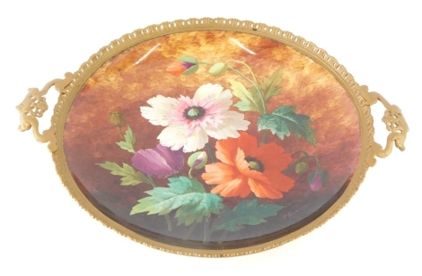 A late 19thC exhibition style pottery wall plate, with metal tray style mount, hand painted with flowers, signed , impressed marks, 46cm diameter.