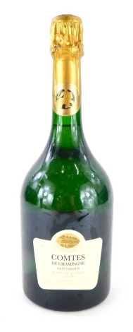 A bottle of Taittinger Comtes Blanc de Blancs 1999 champagne, 750ml.