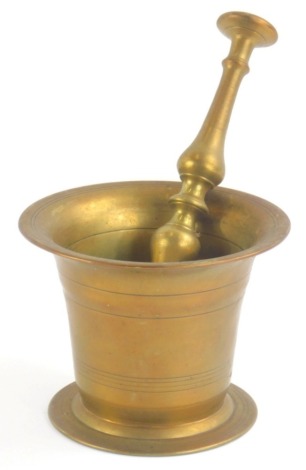 A 19thC brass pestle and mortar, 14cm diameter.