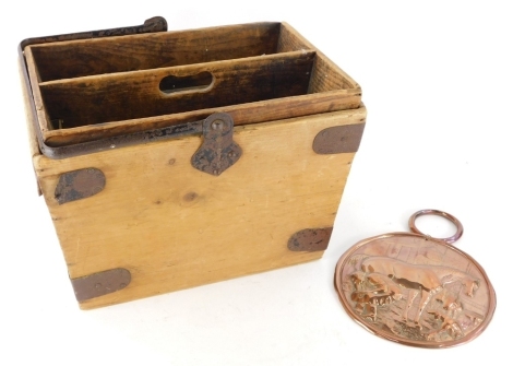 A 19thc housemaid's trug, with metal handle and a copper plaque raised with figure of a farrier with horse, 21cm diameter.