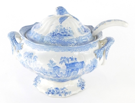 A 19thC J & M P Bell pottery blue and white soup tureen, with ladle, Glasgow design, printed marks beneath, 31cm high.