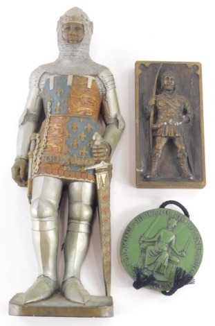 A Marcus Designs wall plaque, raised heraldic knight, marked D.H. Morton, 36cm high and two others. (3)