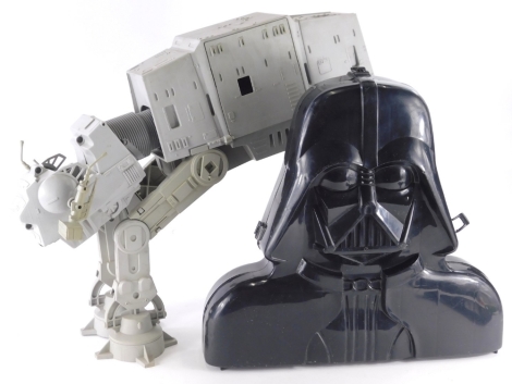 A Lucas Film Star Wars At-At vehicle, 1981 mark, 44cm high, a Darth Vader figure box case (2).