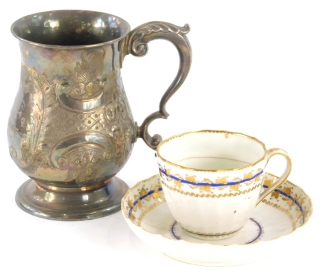 A 19thC Elkington & Co. silver plate baluster tankard, of bulbous form with acanthus leaf scroll handle, engraved 1877, 15cm high. and a cabinet cup and saucer.