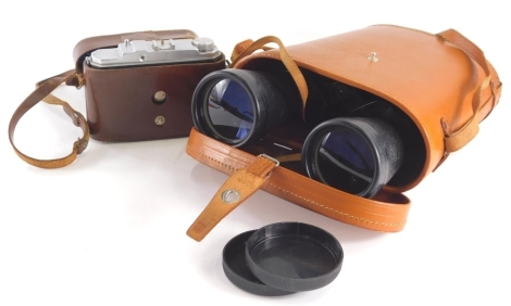 A Foitzik Trier camera, Foinix 6X6, a pair of binoculars, a pair of Green Cat field binoculars, 12x16, leather case.