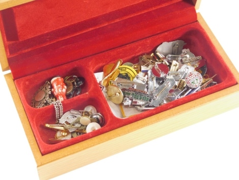 Various pin badges, cap badges and others, iron on badges, other metal badges stamped with GMB shop, 3cm diameter, Santa Claus figure, a silver fob, slender chain, various other costume jewellery and effects, etc., contained in a polished light oak box. (