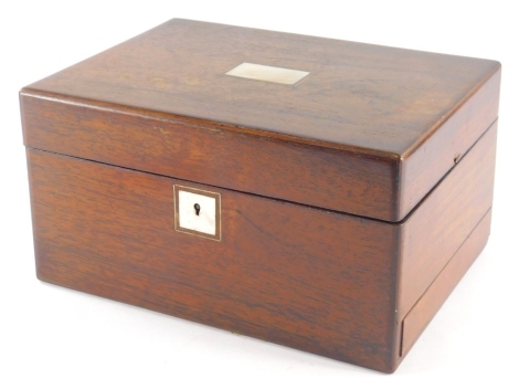 A 19thC rosewood jewellery box, with vacant mother of pearl cartouche and escutcheon and plain interior, 17cm high, 30cm wide, 23cm deep.