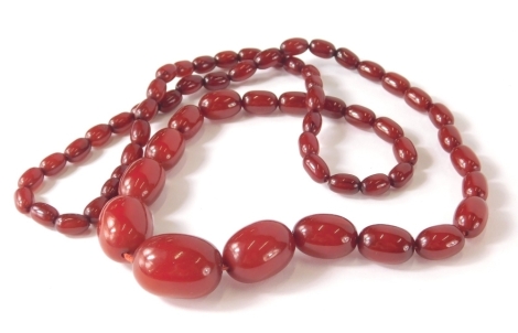 A faux ruby amber finish necklace, with graduated beads, 80cm long.