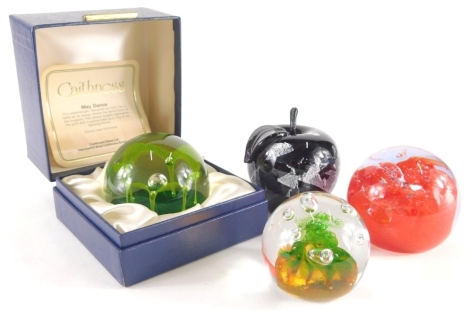 Various Caithness glass paperweights, to include a boxed example May Dance, 8cm diamater, a quantity of others, apple shaped Paul Miller Langham paperweight, Caithness Inferno, etc.