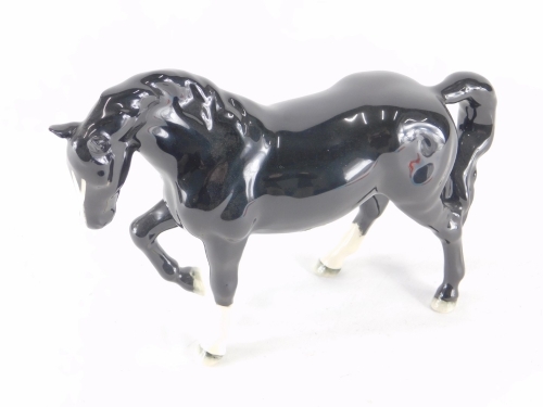 A Beswick pottery horse, Beswick Collectors Club figure 2005 in black and white colourway, printed marks beneath, 15cm high.