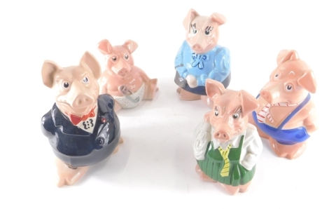 A Wade NatWest pig group, to include Maxwell, 19cm high and four others (5).