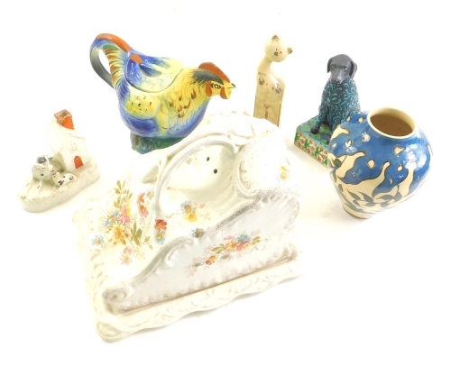 Various pottery and effects, a Rooster tea pot, polychrome decorated predominately in blue, yellow and orange, 15cm high, Victorian mouse shaped cheese dish, Staffordshire hound chimney group figure, Hartwood Creek Jim Shore dog figure, Liquorice, etc. (a