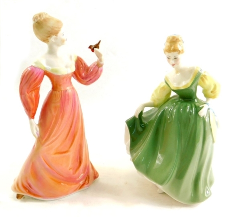 A Royal Doulton figure Fair Lady, HN2193, printed marks beneath, 20cm high, and a Ladies of Fashion Coalport figure Affection. (2)