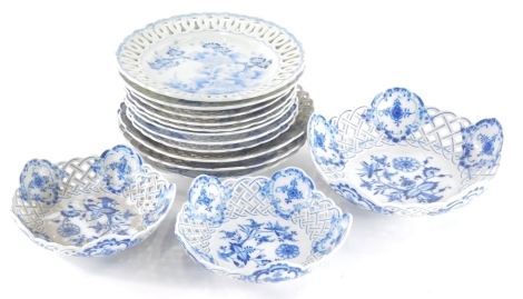 Various Meissen blue and white porcelain dishes, of shaped form with pierced borders to include a basket with flowers, 24cm wide, two smaller, others with cross sword marks beneath and two similar Oriental dishes (a quantity)