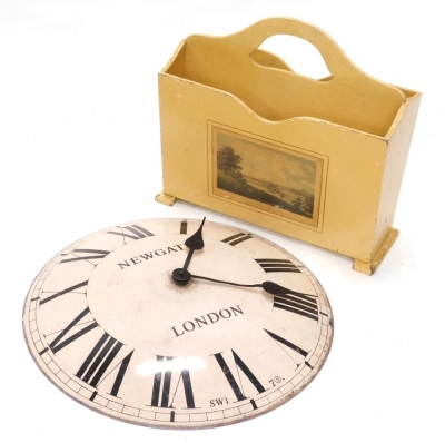 A wall clock with printed name Newgate, London, surrounded by Roman numerals, quartz movement, 50cm diameter, and a cream painted two sectional magazine rack, applied with a print of Chatsworth House.