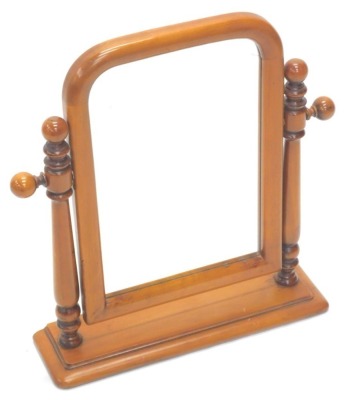 A pine dressing table mirror, on turned supports and rectangular base, 56cm high.