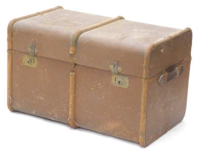 A canvas and wooden two handled travelling trunk, 76cm wide.